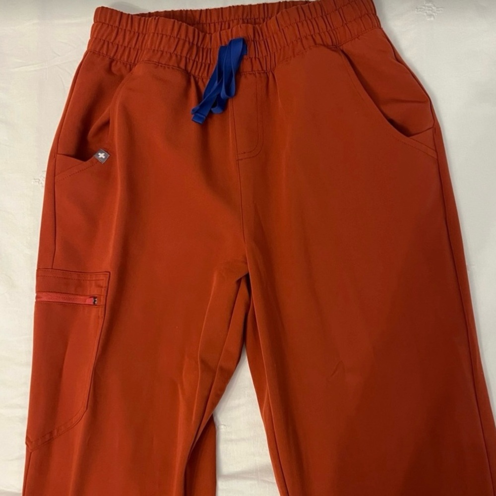 Figs Women's Pants in Rust with Blue Accent